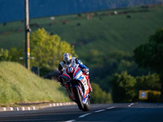 Peter Hickman at Lambfell on his Smiths Racing BMW Superstock machine during Tuesday's Isle of Man TT qualifying session. Picture: Tony Goldsmith/Pacemaker Press.