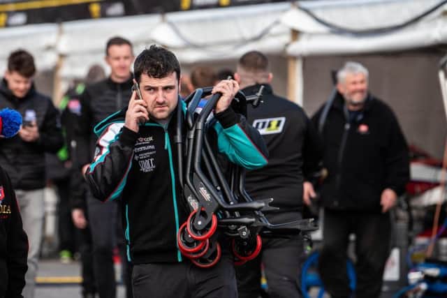 Michael Dunlop returns to his team awning after Friday evening's qualifying session was cancelled at the Isle of Man TT. Picture: Tony Goldsmith/Pacemaker Press.