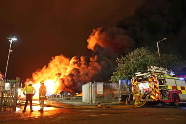 Fire crews battle the huge blaze at industrial premises in the Duncrue area of Belfast. Pic: Steven McAuley/McAuley Multimedia