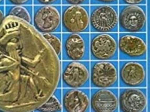 An image of some of the Persian coins stolen during the break-in.