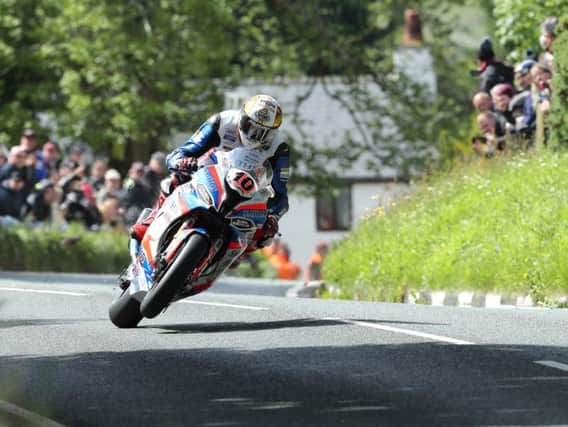 Peter Hickman on the Smiths Racing BMW at the top of Barregarrow during Monday's RST Superbike race at the Isle of Man TT.