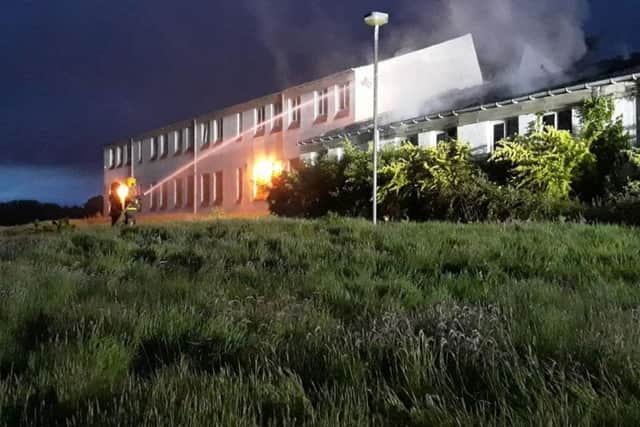 Firefighters battling the blaze at the disused Parkhall College building in Antrim. Pic: NIFRS North