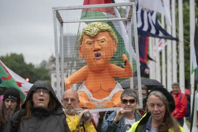Protesters in Parliament Square, London on the second day of the state visit to the UK by US President Donald Trump