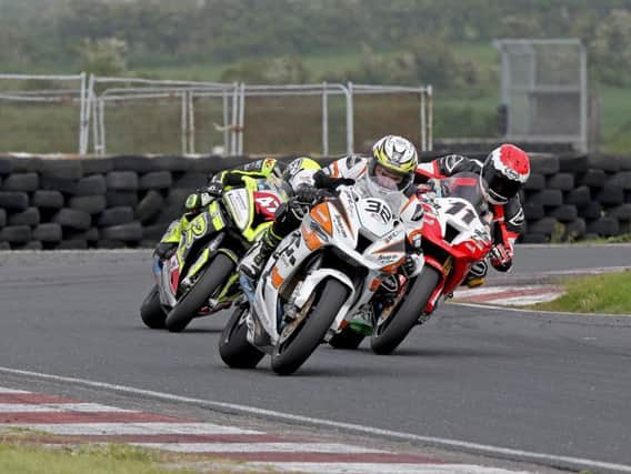 Carl Phillips leads Nico Mawhinney and Alistair Kirk at Kirkistown. Picture: Derek Wilson/Pacemaker Press.