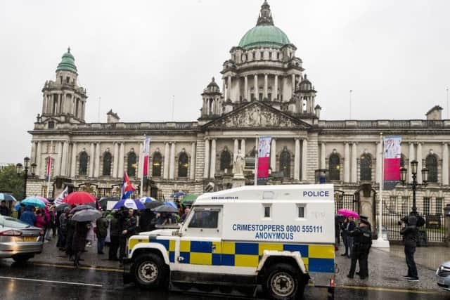 PSNI in attendance at Belfast City Hall after tempers flared at a "Stop Trumpism" rally hosted by ExAct: Expat Action Group NI, at Belfast City Hall. PRESS ASSOCIATION Photo. Picture date: Tuesday June 4, 2019. See PA story IRISH Trump Belfast.  Photo credit should read: Liam McBurney/PA Wire