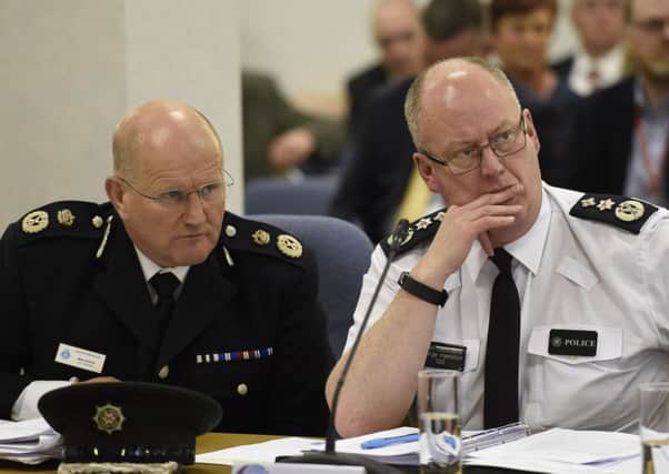 Durham Constabulary Chief Constable Mike Barton (left) and PSNI Chief Constable George Hamilton at yesterdays Policing Board meeting