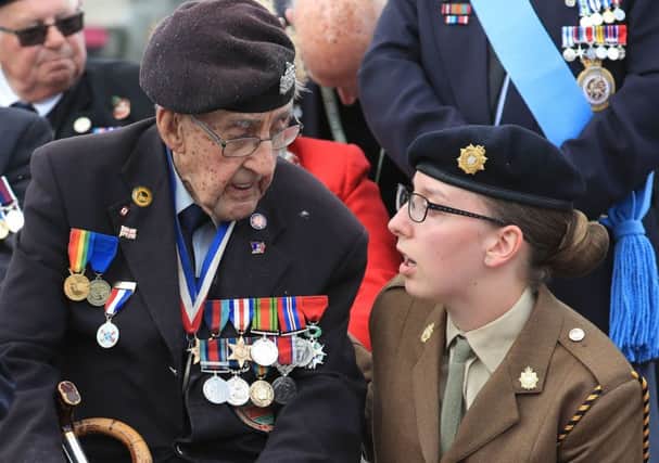 Normandy veteran Leonard Cox takes a seat as veterans start to gather in Arromanches, France, ahead of commemorations for the 75th anniversary of the D-Day landings. PRESS ASSOCIATION Photo. Picture date: Thursday June 6, 2019. See PA story MEMORIAL DDay. Photo credit should read: Gareth Fuller/PA Wire