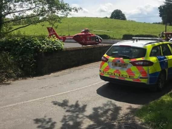 The Northern Ireland Air Ambulance at the scene of a road traffic collision near Buckna. (Photo: P.S.N.I./Twitter)