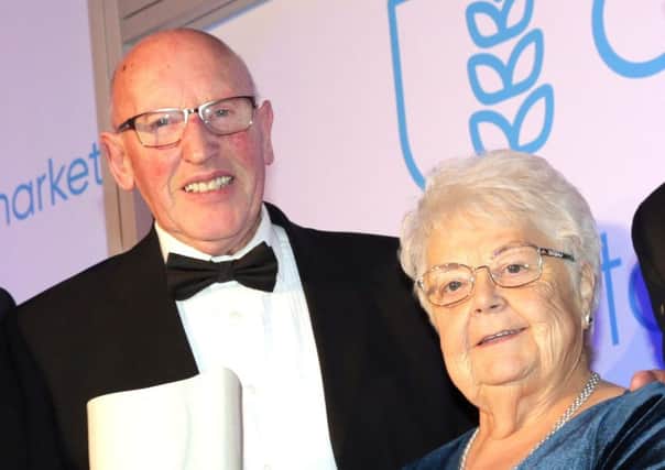 Valerie Crichton, pictured with her husband John, has been awarded a British Empire Medal for services to road racing. Photo: Stephen Davison.