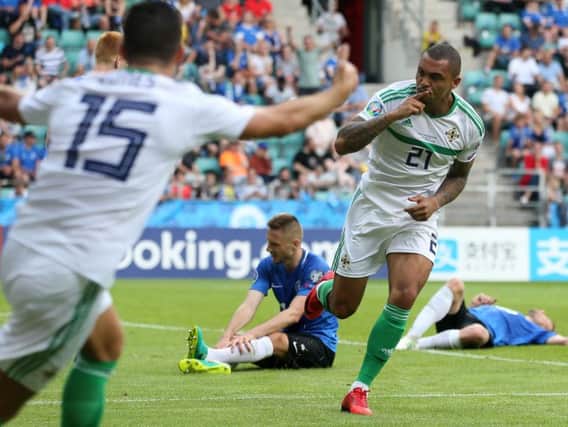 Josh Magennis celebrates scoring for Northern Ireland against Estonia