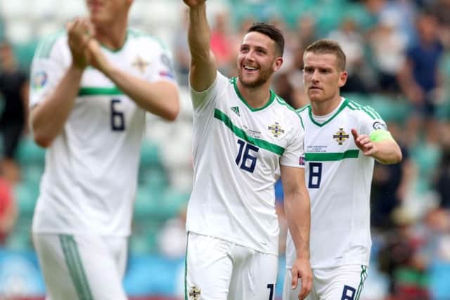 Northern Ireland's Conor Washington celebrates scoring against Estonia
