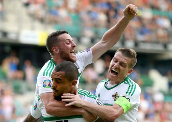 Northern Irelands Josh Magennis celebrates scoring