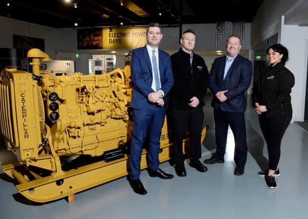 Pictured at the firms Larne facility are Christopher Morrow (Head of Policy at NI Chamber); Stephen Martin (Environment Manager at Caterpillar NI); Mark McClure (Director of Caterpillar NI) and Natasha Sayee (Senior Lead Public Affairs Specialist at SONI).