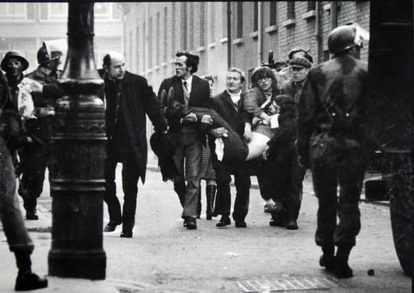 Thirteen people died on Bloody Sunday.  A fourteenth died later.