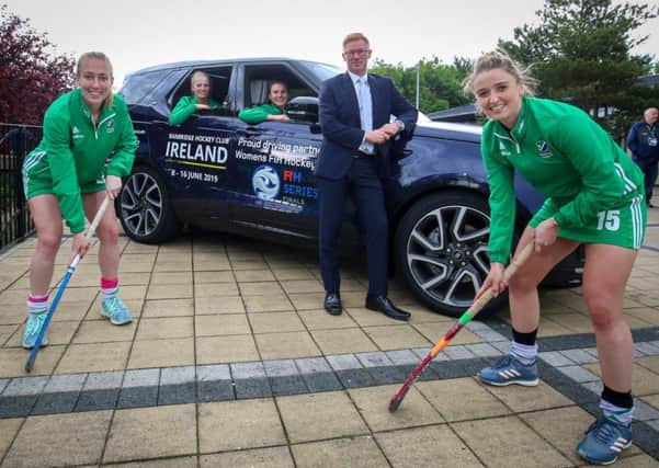 Sarah Hawkshaw, Hannah Matthews, Deirdre Duke and Gillian Pinder from the Ireland ladies team join Alan Thompson, Head of Business at Charles Hurst Jaguar Land Rover