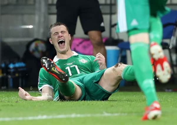 Northern Ireland's Paddy McNair celebrates scoring the winning goal against Belarus
