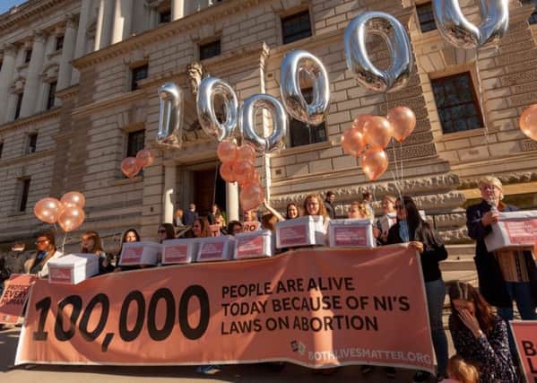 Pro-life campaigners march on Parliament in February to highlight the 100,000 people they estimated are alive today because of Northern Irelands restrictive abortion laws.