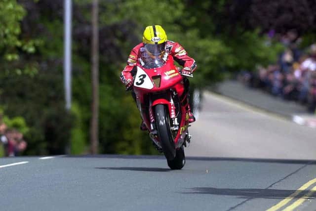 Joey Dunlop on the Honda SP-1 during his last appearance at the Isle of Man TT in 2000, where he won three races.