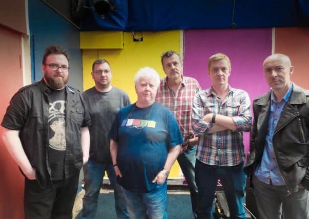 Stuart Neville, left, with band members Mark Billingham (vocals/guitar), Chris Brookmyre (vocals/guitar), Doug Johnstone (drums), Val McDermid (vocals), and Luca Veste (bass)
