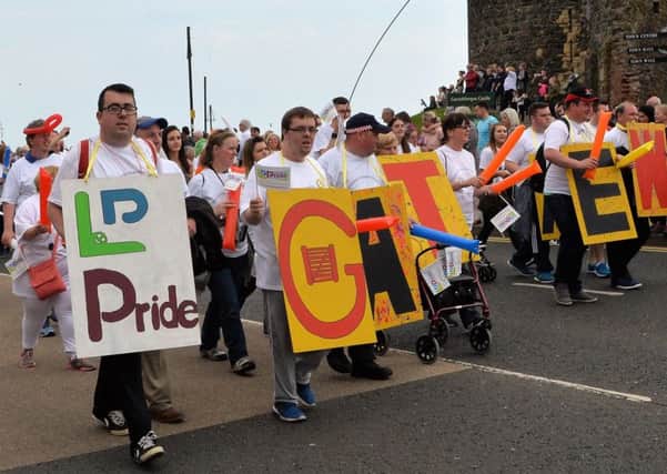 Members of Carrickfergus Senior Gateway Club taking part in the Learning Disability Pride Parade in Carrickfergus in 2017. INCT 22-003-PSB