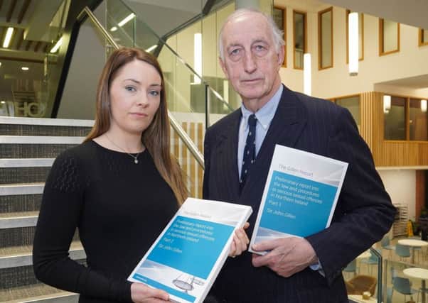 John Gillen with the preliminary draft of his report alongside Dr Eithne Dowds from Queens University Belfast, one of the contributors to the review process, who describes herself as a lecturer interested in feminism and consent