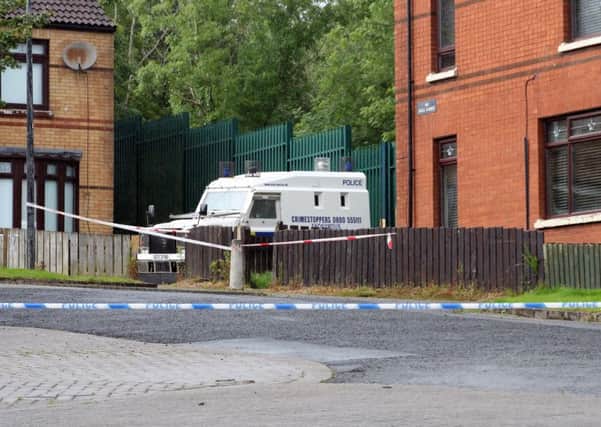 Police launched an investigation after two people were found dead in a house in West Belfast. 
The pair, understood to be a man and a woman, were discovered at a property in the Woodside Drive area of Poleglass on Thursday.