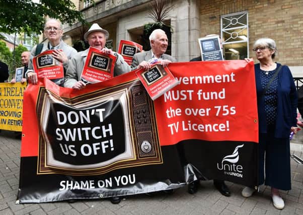 Around 60 people protested outside Broadcasting House in Belfast against the BBCs decision to scrap free TV licences for the over-75s