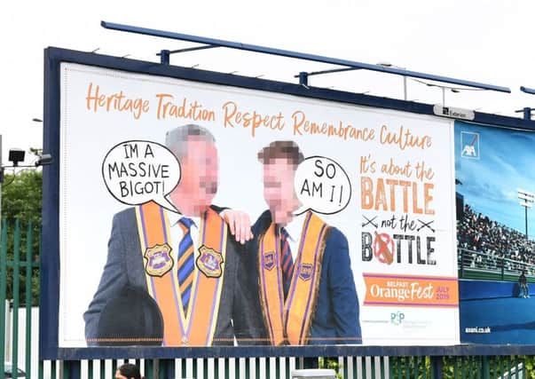 The defacing of an Orange Order billboard close to the M3 in Belfast has been condemned by Rev Mervyn Gibson