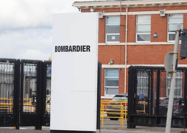 Belfast Bombardier staff work on the jet programmes fuselage