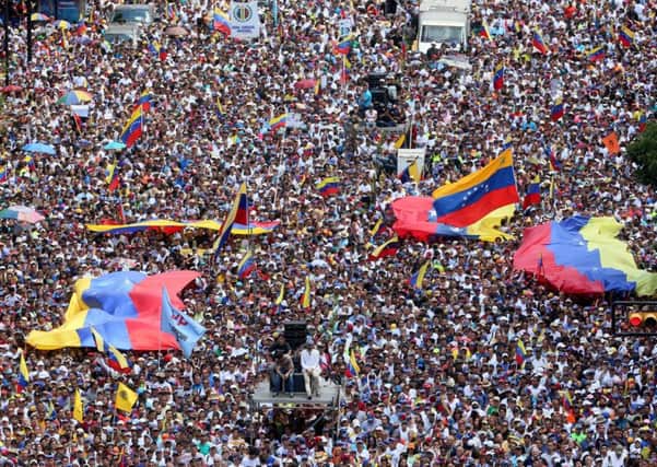 A mass protest against the Venezuelan government this February following years of shortages and rising poverty; SF MPs took Venezuelan-funded trips in 2017/2018 worth about £2,300, and were described as election observers