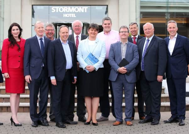 DUP leader Arlene Foster (centre) with her 10 MPs.
 IRA victim Jonathan Ganesh has called on all the party's MPs to emulate Nigel Dodds in calling on the Prime Minster to secure compensation for them from Libya