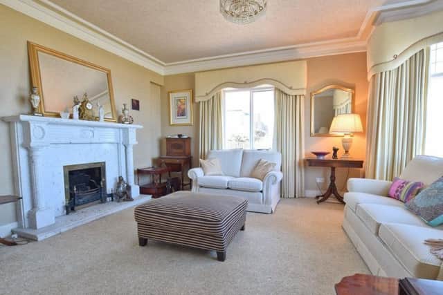 The home offers spacious accommodation with six bedrooms and four reception rooms