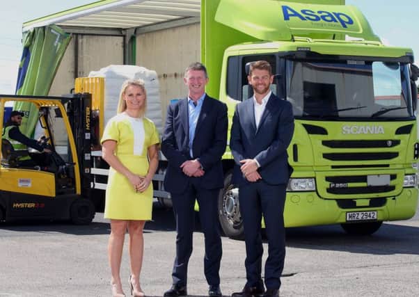 (L-R) are Michelle Wilson, Business Manager and Robert McCullough, Head of Belfast Business Centre at Danske Bank with Mark Adamson, Managing Director of Asap Cargo.