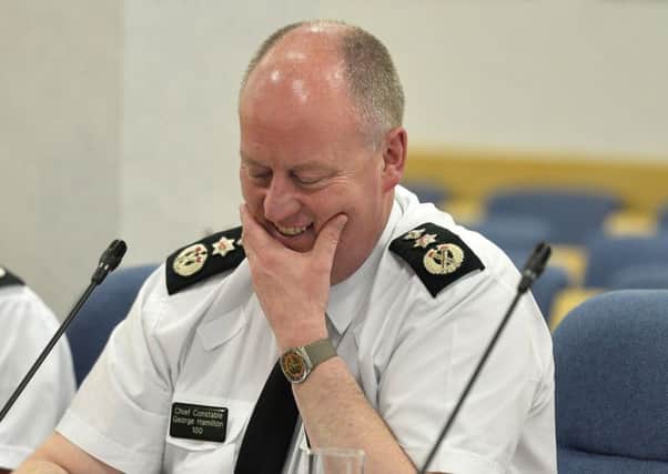 Chief Constable George Hamilton answers questions at his final Policing Board meeting at Clarendon Dock  before he retires.
Pic: Colm Lenaghan/Pacemaker