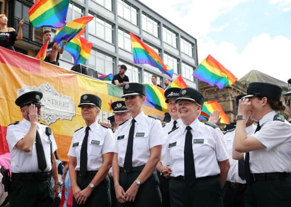 Members of the PSNI and the Garda join thousands of people as they take part in the annual Belfast Pride event in Belfast city centre.

Photo by Kelvin Boyes / Press Eye.