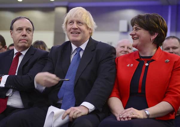 Boris Johnson pictured with the DUP leader at the partys conference last year