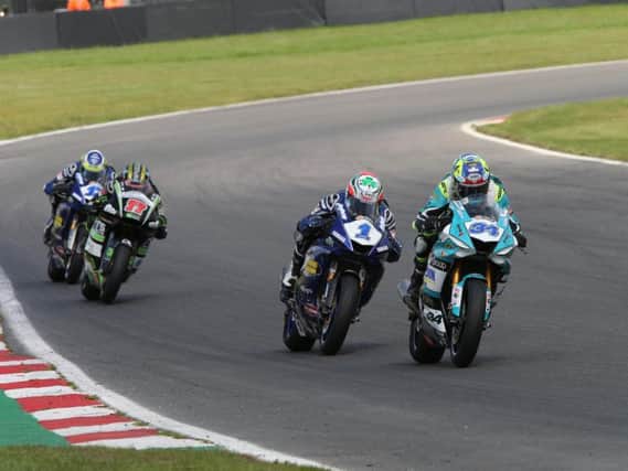 Alastair Seeley (34) leads British Supersport champion Jack Kennedy (1) at Brands Hatch. Picture: David Yeomans.