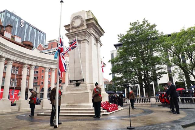 Wreaths are laid at the cenotaph in Belfast during the annual ceremony to remember those who gave their lives during the Battle of the Somme. Photo by Kelvin Boyes / Press Eye.
