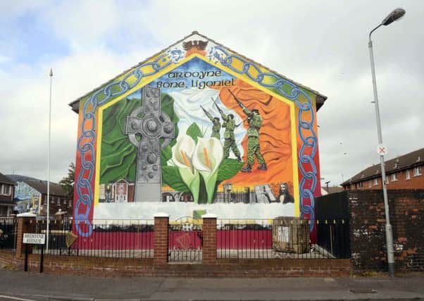 A republican mural in north Belfast, after being newly-painted in 2014