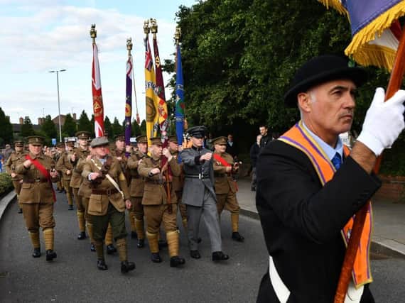 Men dressed in traditional WW1 uniform were among those on parade to mark the anniversary of the Battle of the Somme. Pics: Colm Lenaghan, Pacemaker