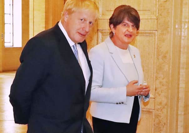 Boris Johnson expressed his support for a bridge to Scotland at the Tory hustings at the Culloden hotel. Later on Tuesday at Stormont he met with Arlene Foster, above, leader of the DUP, a party that also backs a fixed link. Photo: Niall Carson/PA Wire