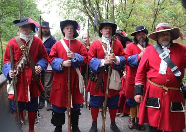 Volunteers with Living History Ireland demonstrate the lives of Williamite soldiers