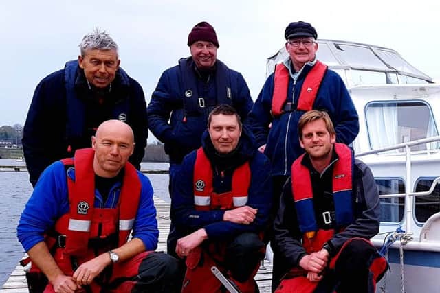 The Lough Erne Survey Team (from top left) Robert Navan (Skipper of Aquarius & CSIG, IWAI), Les Saunders (CSIG, IWAI), Mike Kingston (CSIG, IWAI) (from bottom left) Tim Mackie (DAERA), Ronnie Snijder (DAERA), Rory McNeary (Marine Archaeologist, DAERA).