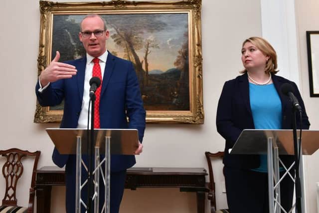 Simon Coveney and Karen Bradley at Stormont in April. "The two governments have strived to avoid dealing with crimes, as in their view that is necessary for the political process. Essentially to ignore murder! They failed to resource our criminal justice system to enable it to bring to justice those responsible for those crimes."
Photo Colm Lenaghan/Pacemaker Press