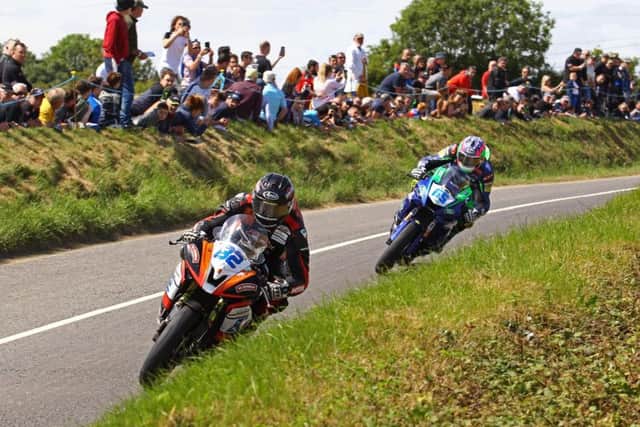 Derek Sheils (Roadhouse Macau Yamaha) leads Michael Sweeney (MJR Yamaha) in the Supersport race at the Skerries 100 on Sunday. Picture: Rod Neill/Pacemaker Press.