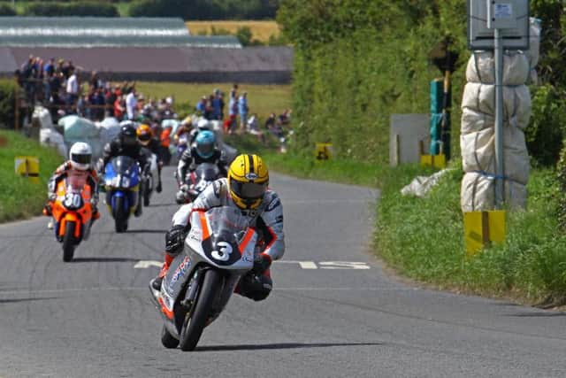 Gary Dunlop (Joey's Bar Honda) leads the Moto3/125GP race at the Skerries 100. Picture: Rod Neill/Pacemaker Press.
