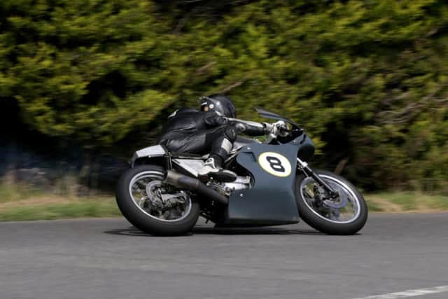 Lincolnshire's Guy Martin won the Senior Classic race after a close battle with Richard Ford at the Skerries 100.