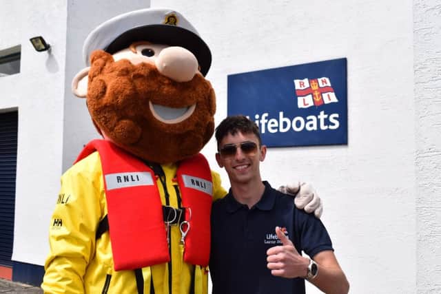 RNLI mascot Stormy Stan and crew member Jack Healy.
