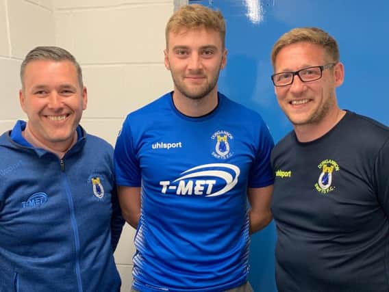Dungannon Swifts Chairman, Keith Boyd and Manager, Kris Lindsay pictured with new signing, Dylan King