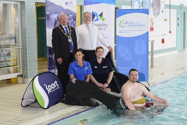(L-R) Mayor of Antrim and Newtownabbey, Alderman John Smyth; Robert Heyburn, Department for Communities; Andrea Herron from Disability Sport NI; Jayne Moore from Sport NI and local resident Gareth McNeilly launch the Poolpod at Antrim Forum